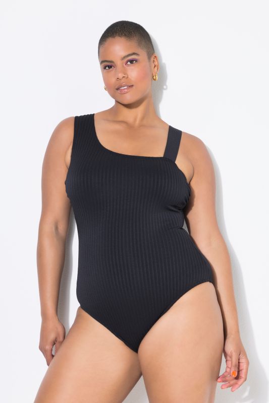 Maillot de bain à bonnets souples. Effet épaule nue. Matière à rayures texturées