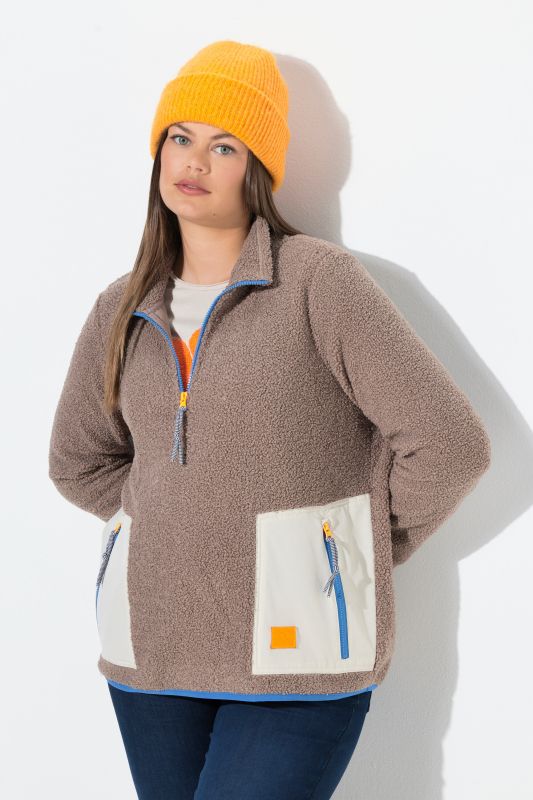 Sweat en polaire bouclée. Col montant, manches longues. Label OEKO-TEX