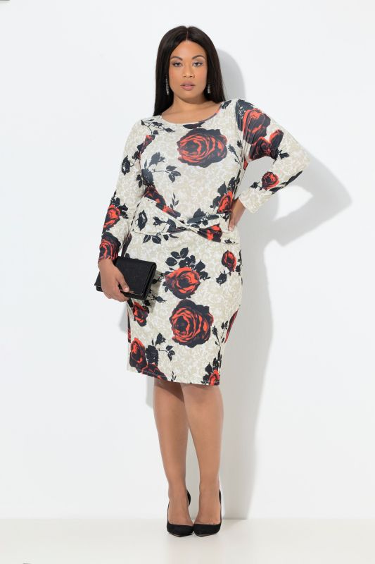 Robe en jersey coupe Slim, avec motif roses et décolleté en V au dos