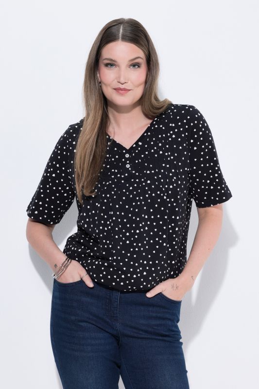 T-shirt avec passepoils, décolleté en V et manches courtes, coupe évasée