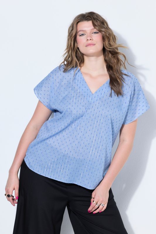 Blouse oversize, texture et paillettes