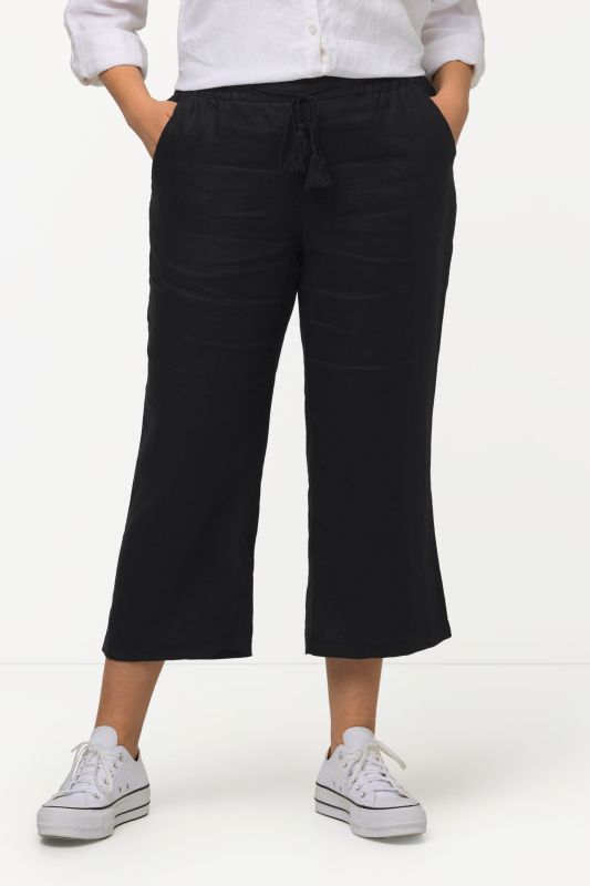 Pantalon en lin 7/8 à taille élastique. Naturellement respirant