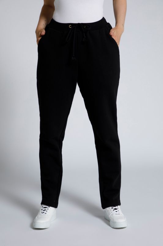 Pantalon en molleton. Intérieur doux et confortable. Taille élastique