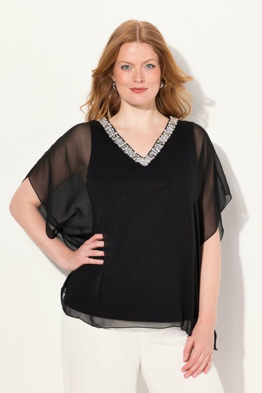 Blouse en mousseline, décolleté en V et manches courtes, doublure