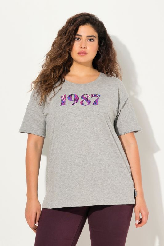 T-shirt oversize, imprimé chiffres. Col rond, manches courtes.