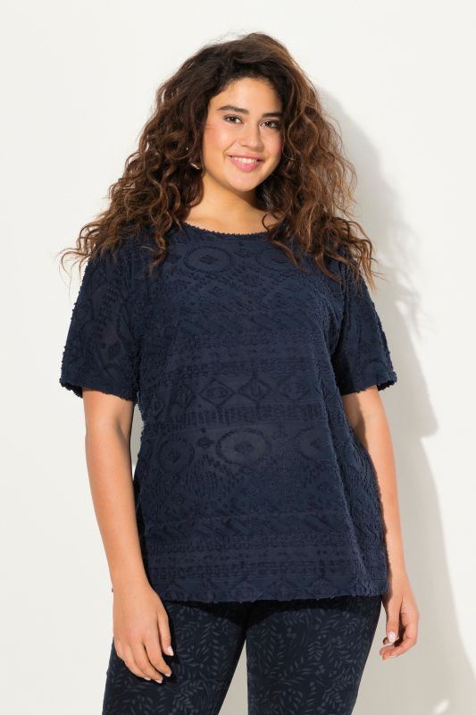 T-shirt oversize avec imprimé. Manches courtes et col rond.