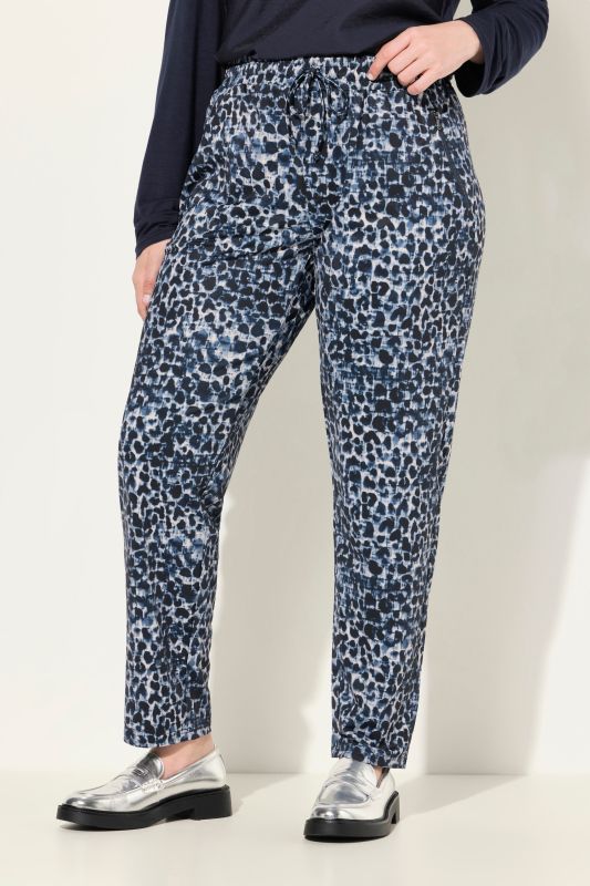 Pantalon en jersey motif léopard, taille élastique et poches zippées