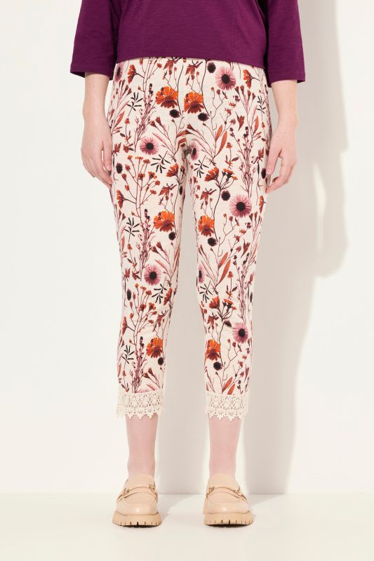 Legging 7/8 en coton bio, taille élastique. Imprimé à fleurs et dentelle.