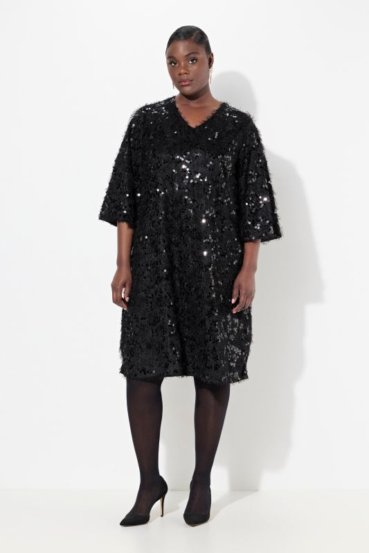 Robe de soirée avec franges et paillettes, manches courtes et décolleté en V