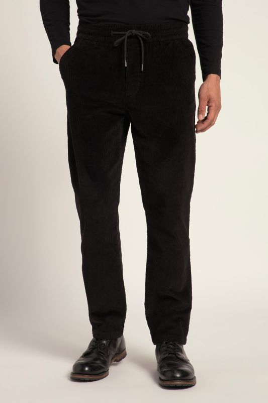 Pantalon en velours côtelé. Taille élastique et coupe Modern Fit.