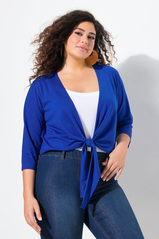 Boléro en jersey noué à la taille. Veste courte à manches 3/4