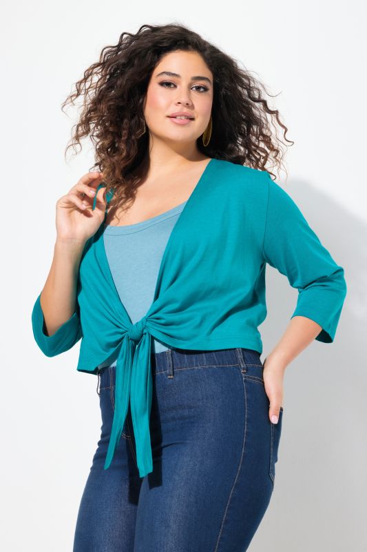 Boléro en jersey noué à la taille. Veste courte à manches 3/4