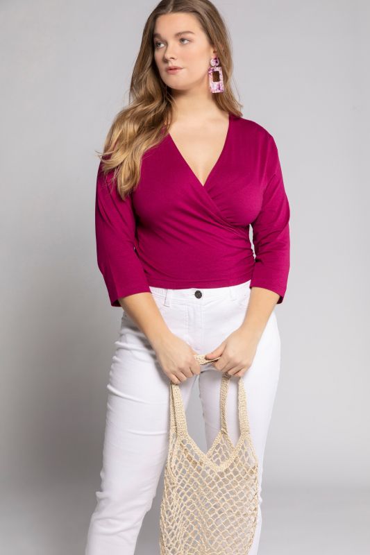 Boléro en jersey noué à la taille. Veste courte à manches 3/4
