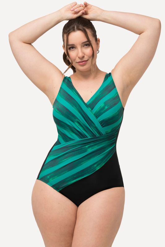 Maillot de bain à bonnets souples. Rayures et décolleté esprit cache-cœur. Matière recyclée.