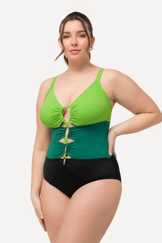 Maillot de bain esprit colour block, bonnets souples. Matière recyclée et découpes.