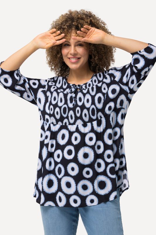 Chemise smockée à motif cercles. Ligne A, col rond et manches 3/4