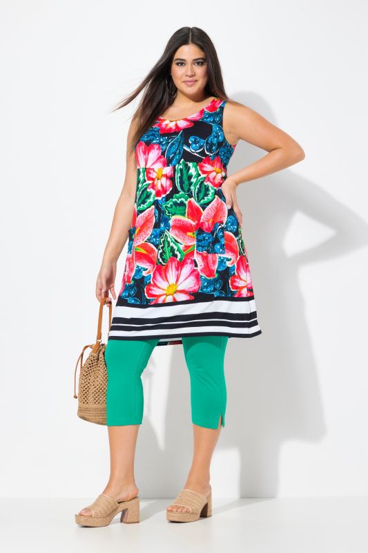 Robe courte en jersey, sans manches. Silhouette en A évasée. Décolleté rond et imprimé cachemire.