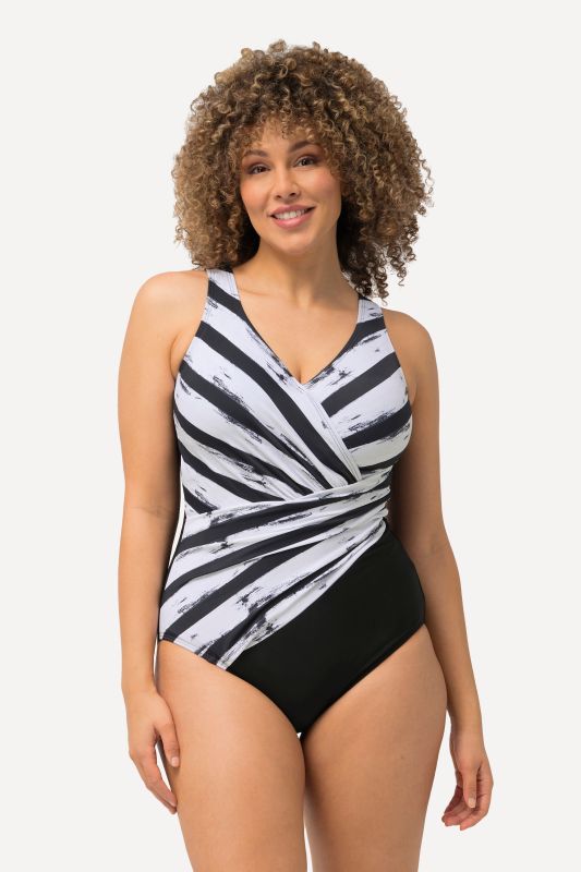 Maillot de bain drapé, bonnets souples. Matière recyclée, rayures.