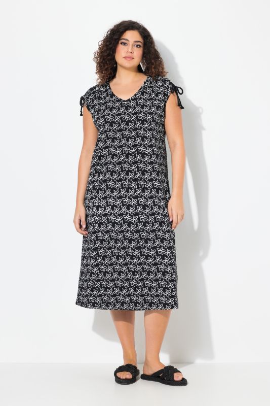 Robe midi à fleurs, sans manches, décolleté en V et coupe évasée