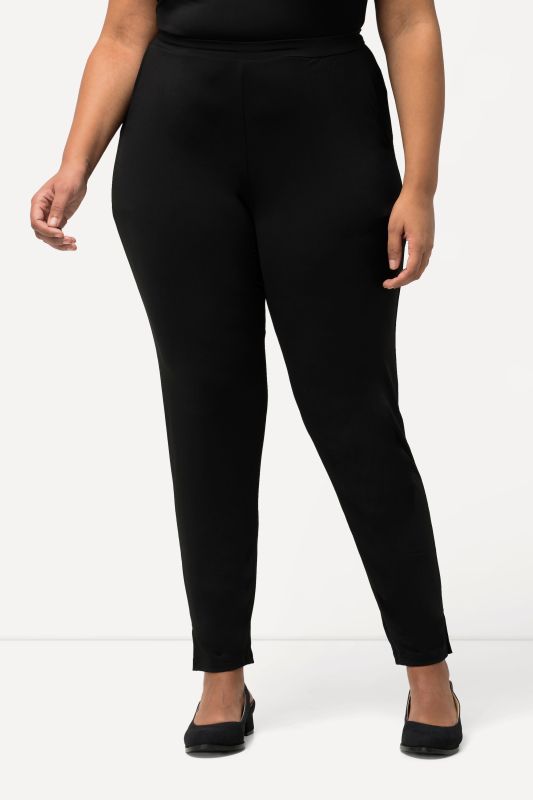 Pantalon en jersey avec jambe étroite et taille élastique. Disponible jusqu’au 68/70