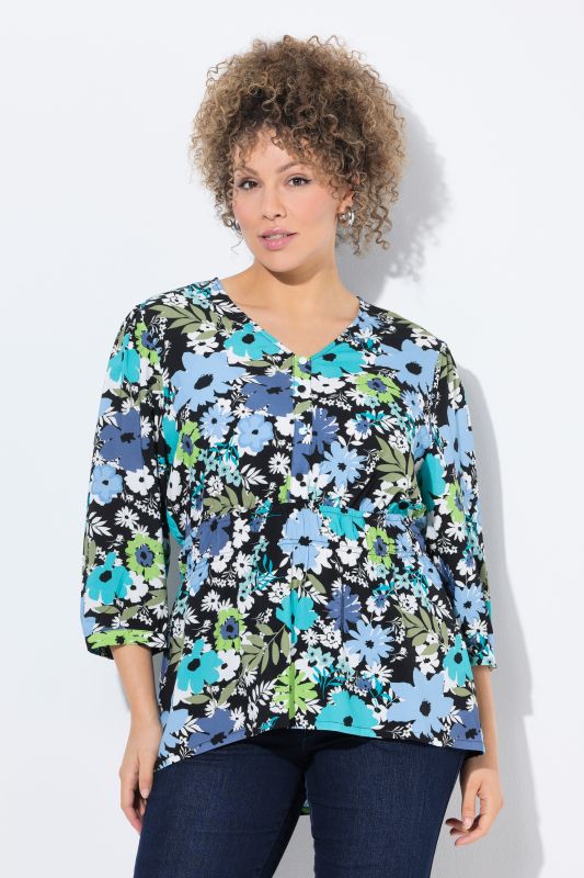Blouse motif floral, décolleté en V et manches 3/4, coupe évasée