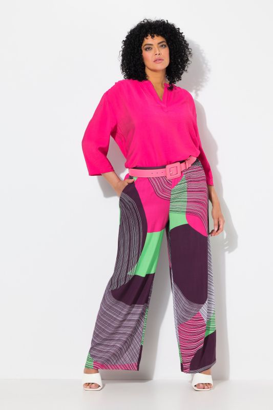 Pantalon imprimé. Jambe large et droite. Taille élastique