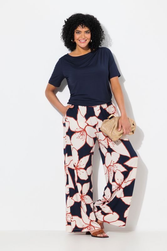 Pantalon en jersey à motif floral. Jambe droite et large. Taille élastique