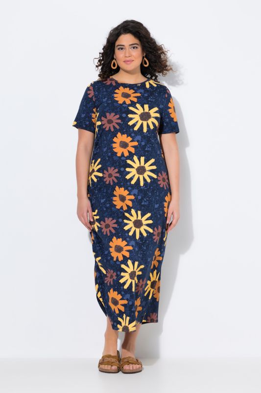Robe maxi en jersey de coton bio. Encolure ronde et manches courtes. Motif floral