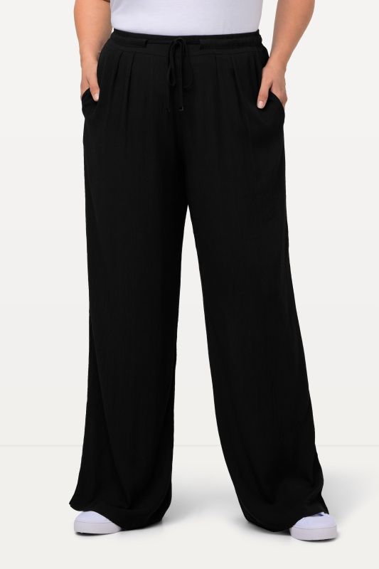 Pantalon Rose en viscose. Jambe large, taille élastique et cordon de serrage
