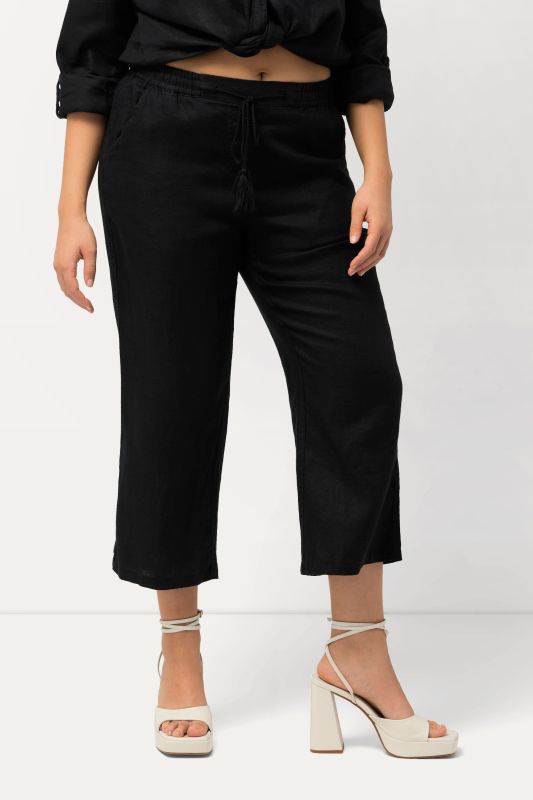 Pantalon 7/8 en lin, naturellement respirant. Taille élastique