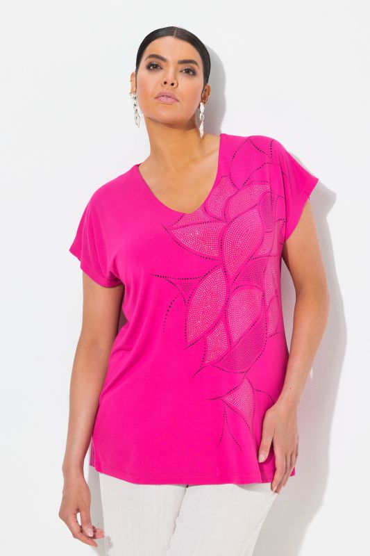 T-shirt oversize. Col en V et manches courtes. Imprimé chatoyant