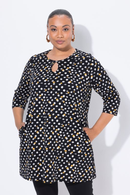 T-shirt long imprimé à pois, décolleté rond et manches 3/4, coupe évasée
