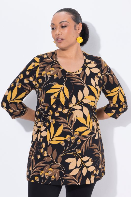 T-shirt long à fleurs, décolleté rond et manches 3/4, coupe évasée