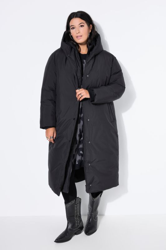Manteau matelassé oversize, capuche et fermeture zippée à double sens