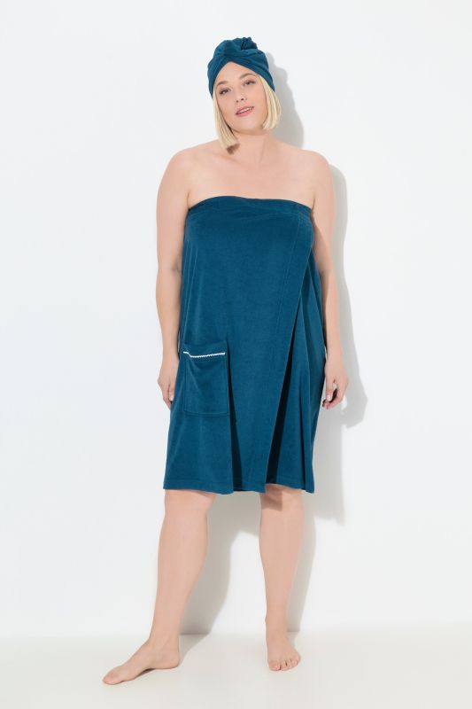 Robe sortie de bain en éponge. Fermeture velcro. Bande élastique dans le dos