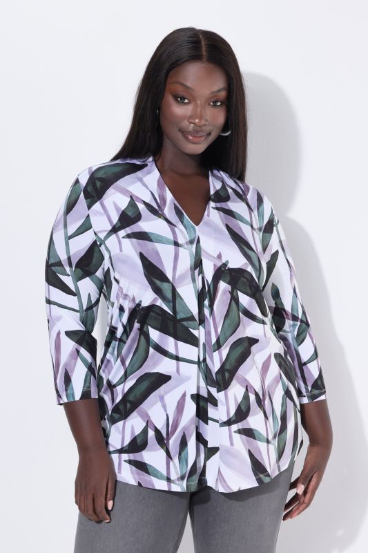 T-shirt au tombé fluide, motif feuilles, col calice et manches 3/4, coupe évasée