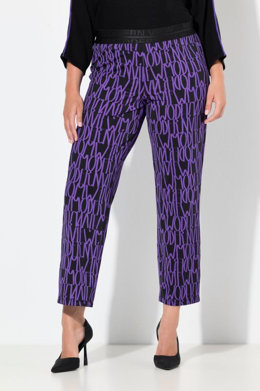 Pantalon Sienna en jersey motif lettres, taille élastique et jambe étroite