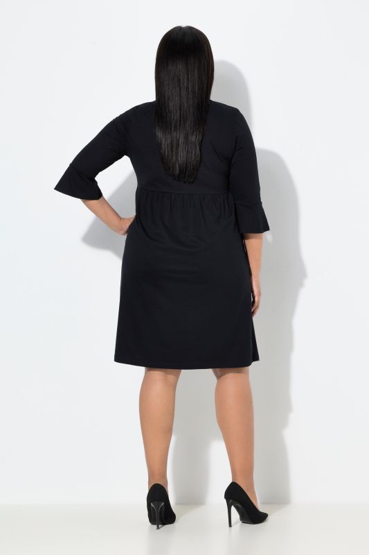 Robe en jersey, coupe évasée, décolleté en V et manches 3/4