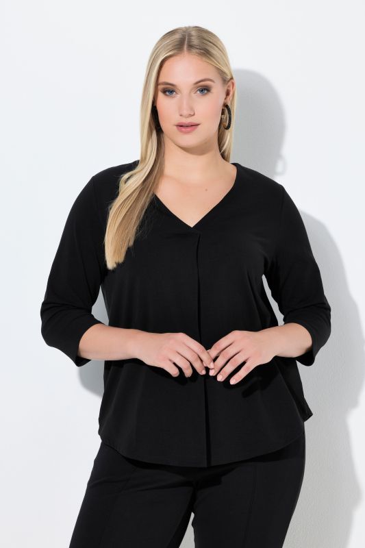 Blouse décolleté en V avec pli fantaisie, manches 3/4 et coupe évasée
