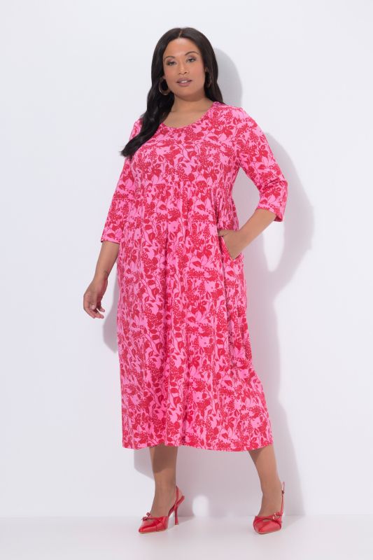 Robe maxi motif floral, poches, décolleté rond et manches longues, coupe évasée