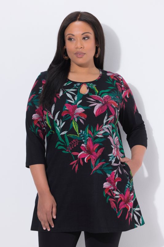 T-shirt long à manches 3/4, décolleté rond avec « trou de serrure », coupe évasée