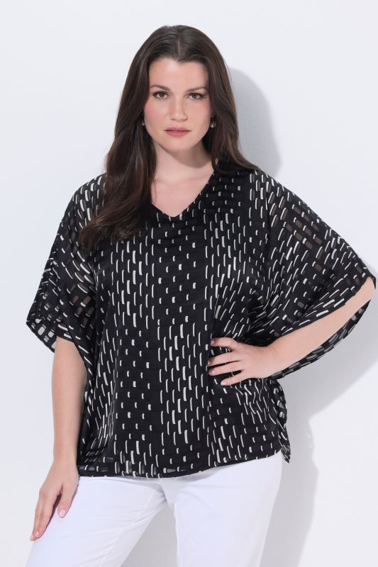 Blouse doublée en mesh, coupe oversize, décolleté en V et manches courtes