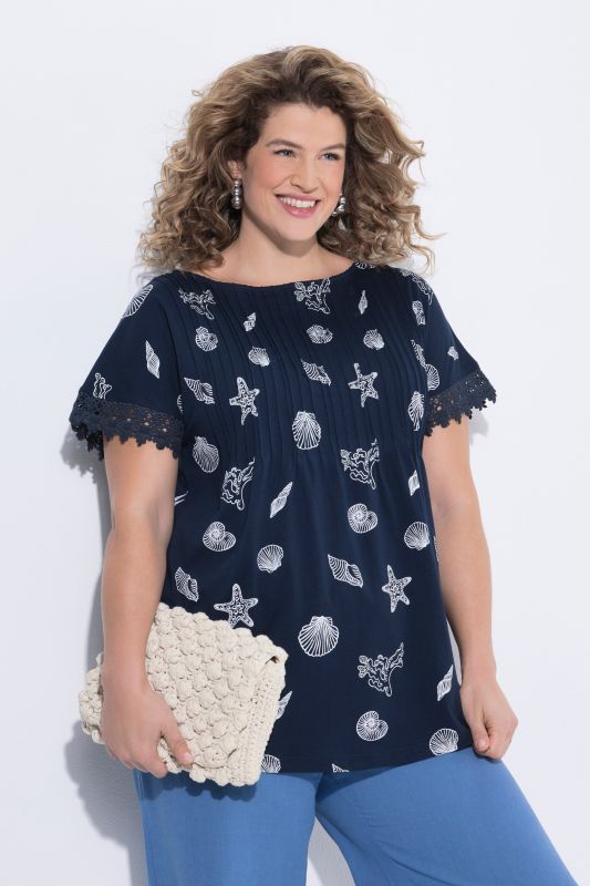 T-shirt en coton bio, manches courtes, encolure bateau et passepoils