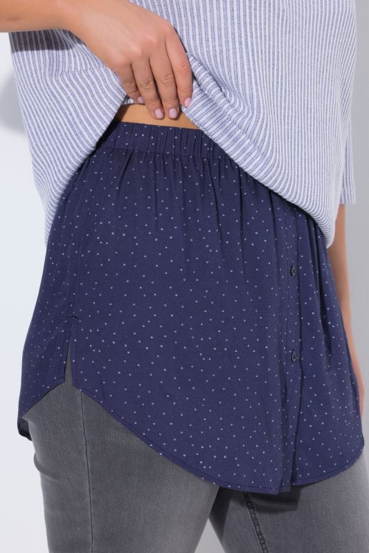 Rallonge pour chemisier, motif à pois, base arrondie et coupe évasée