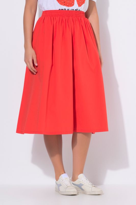 Jupe midi, matière stretch et taille élastique, coupe évasée