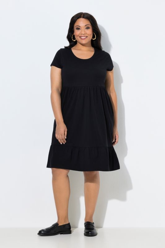 Robe en jersey avec poches, décolleté rond et manches courtes, coupe évasée