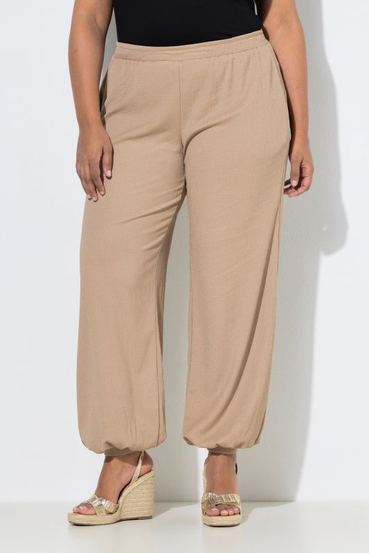 Pantalon en crêpe, jambe large et taille élastique