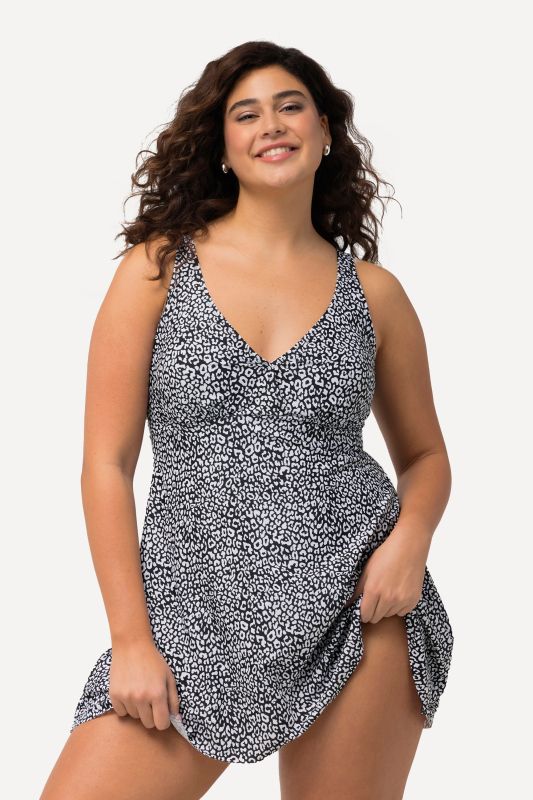 Robe de bain à bonnets souples. Imprimé léopard et effet cache-cœur.