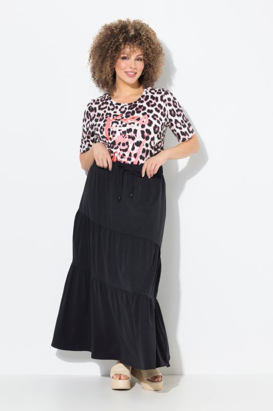 Jupe maxi en jersey. Volants. Taille élastique. Coupe évasée