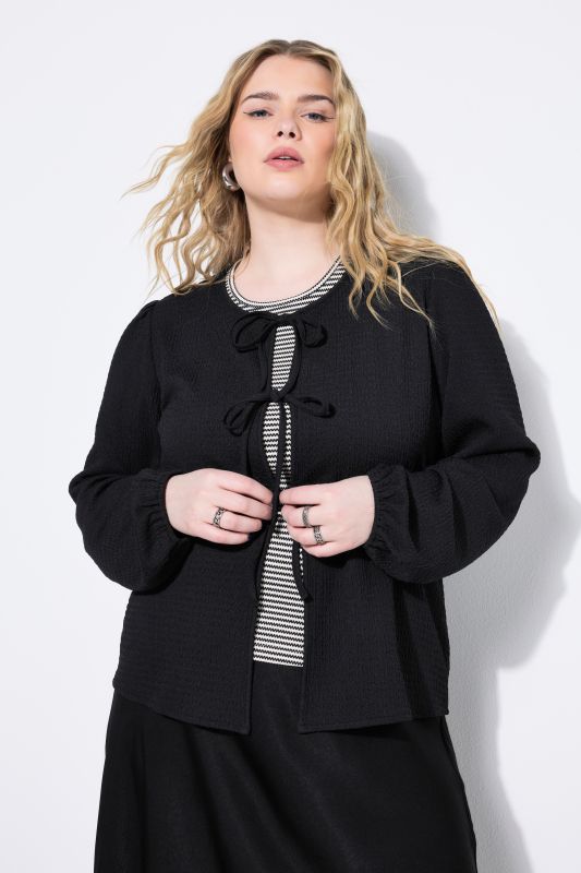 Blouse manches bouffantes, fermeture avec rubans